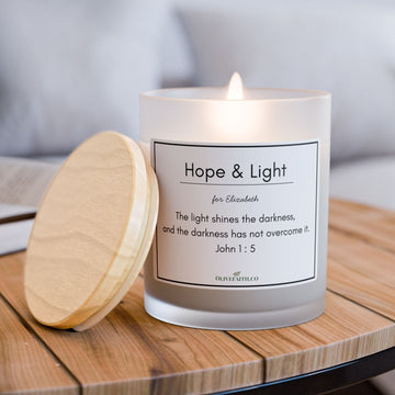 Candle labeled 'Hope & Light' . Christan candles